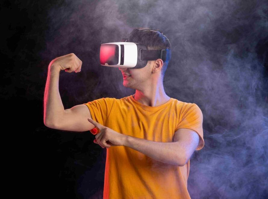 handsome-male-playing-game-virtual-reality-dark-surface_11zon