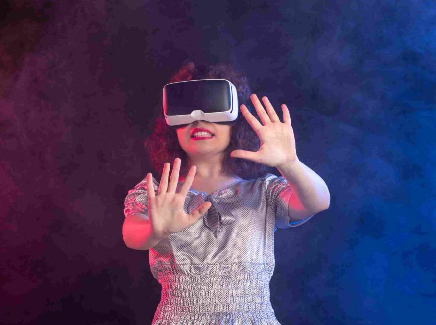 young-female-wearing-virtual-reality-headset-dark-blue-surface_11zon